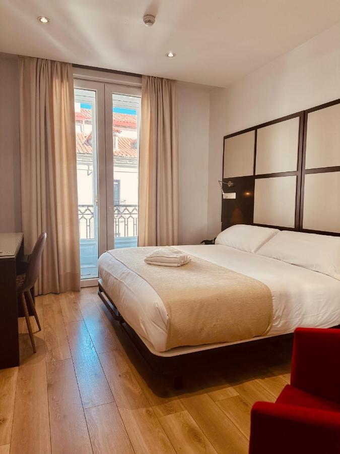 Quarto Duplo com Varanda e Vista da Cidade